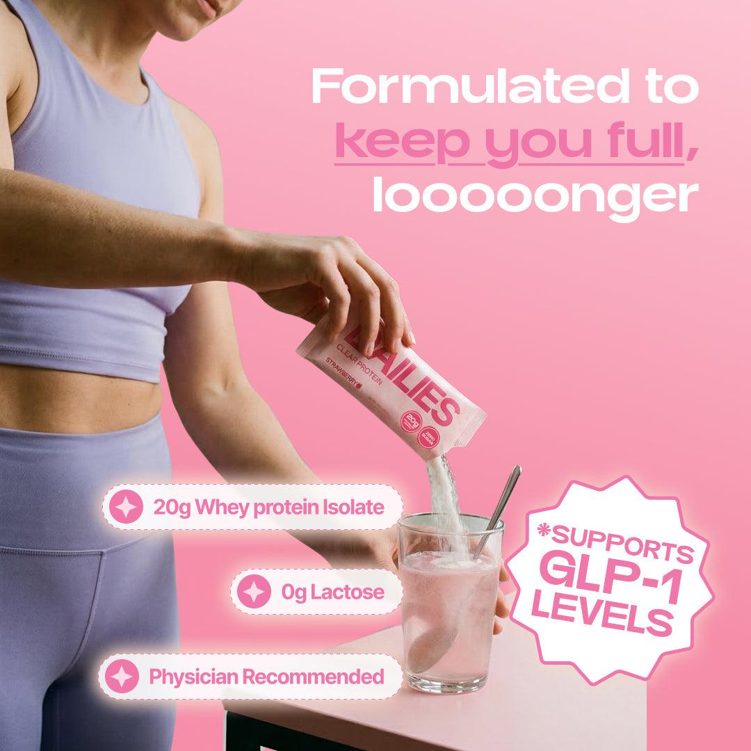 Person pouring Strawberry powder into a pink drink. Graphic claims longer fullness, GLP-1 support and physician recommendation; lists 20 g whey protein isolate and 0 g lactose. #flavor_strawberry
